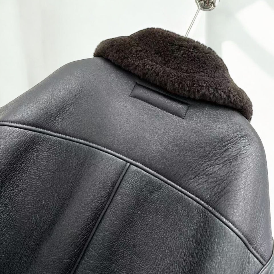 Peruvian baby alpaca wool cape styled with quiet luxury accessories.