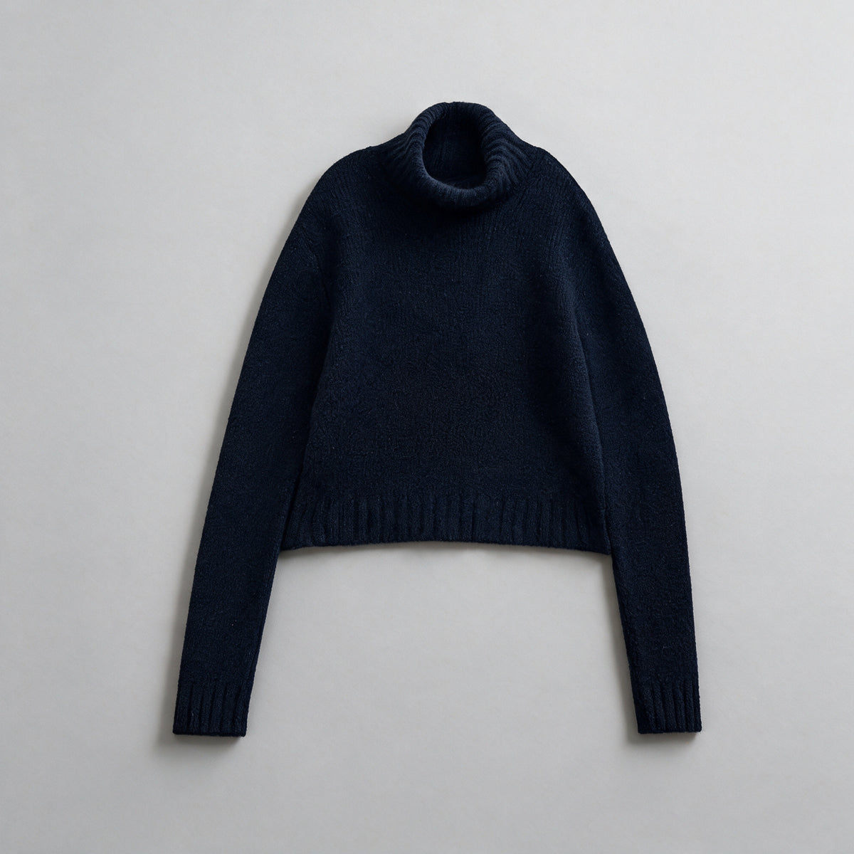 cashmere wool turtleneck sweater in navy, front