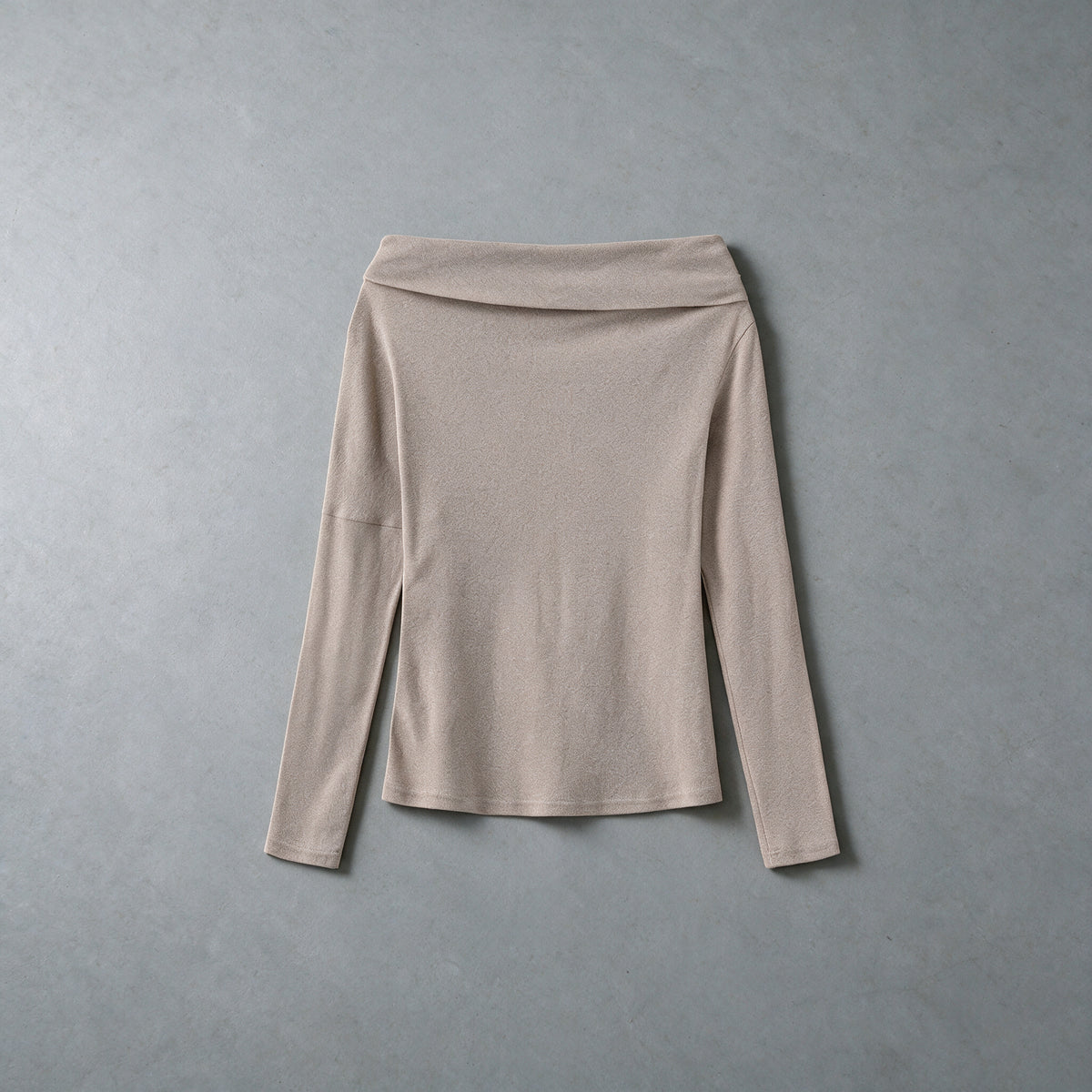 Light greige cotton one-shoulder top with long sleeves and a folded neckline band, flat view