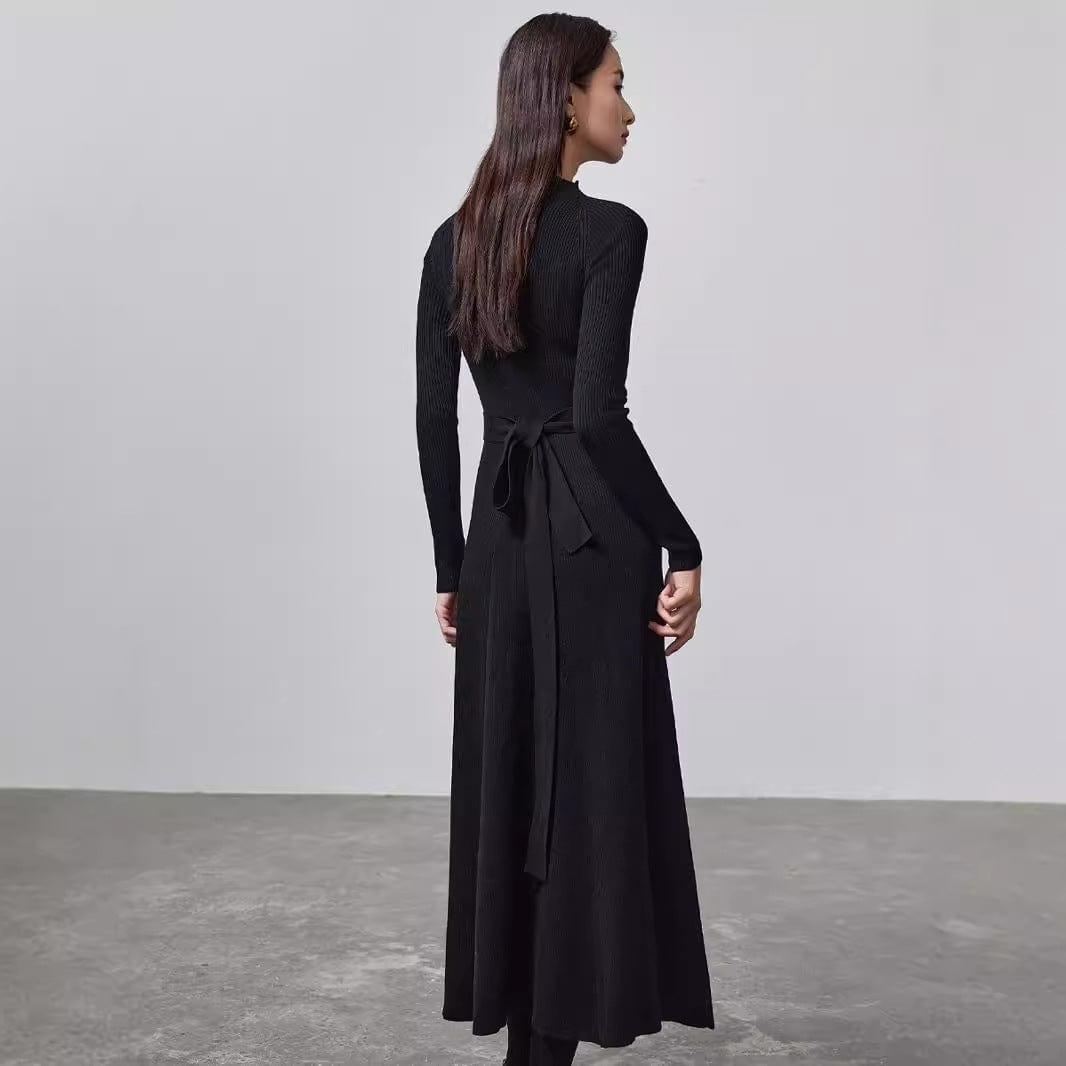 An elegant long knit dress, perfect for pre-autumn layering.