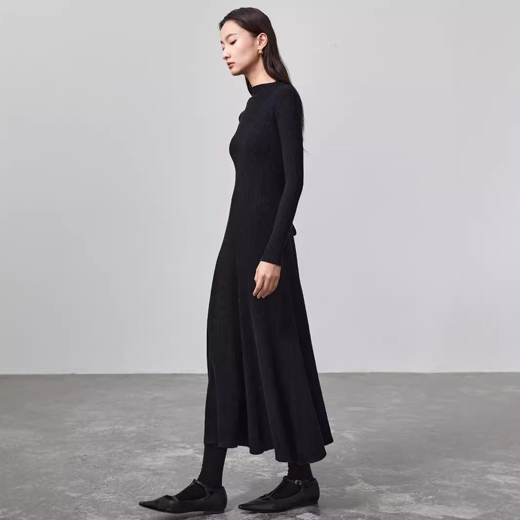 Flattering, versatile, and low-maintenance—the ultimate wool base dress.