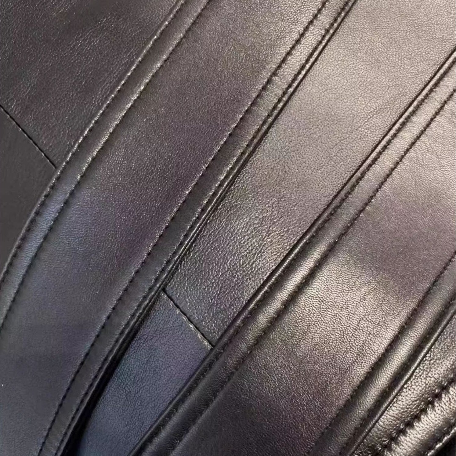 brown leather trench coat close up