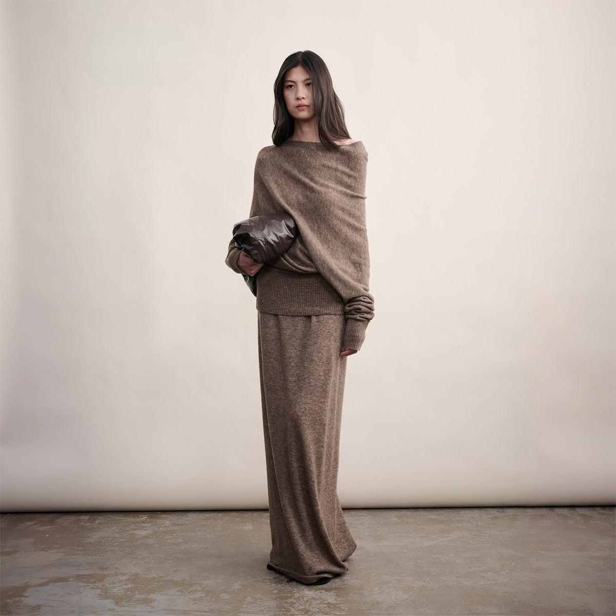 Brown off-shoulder wool sweater and long skirt set, full-length front view on model