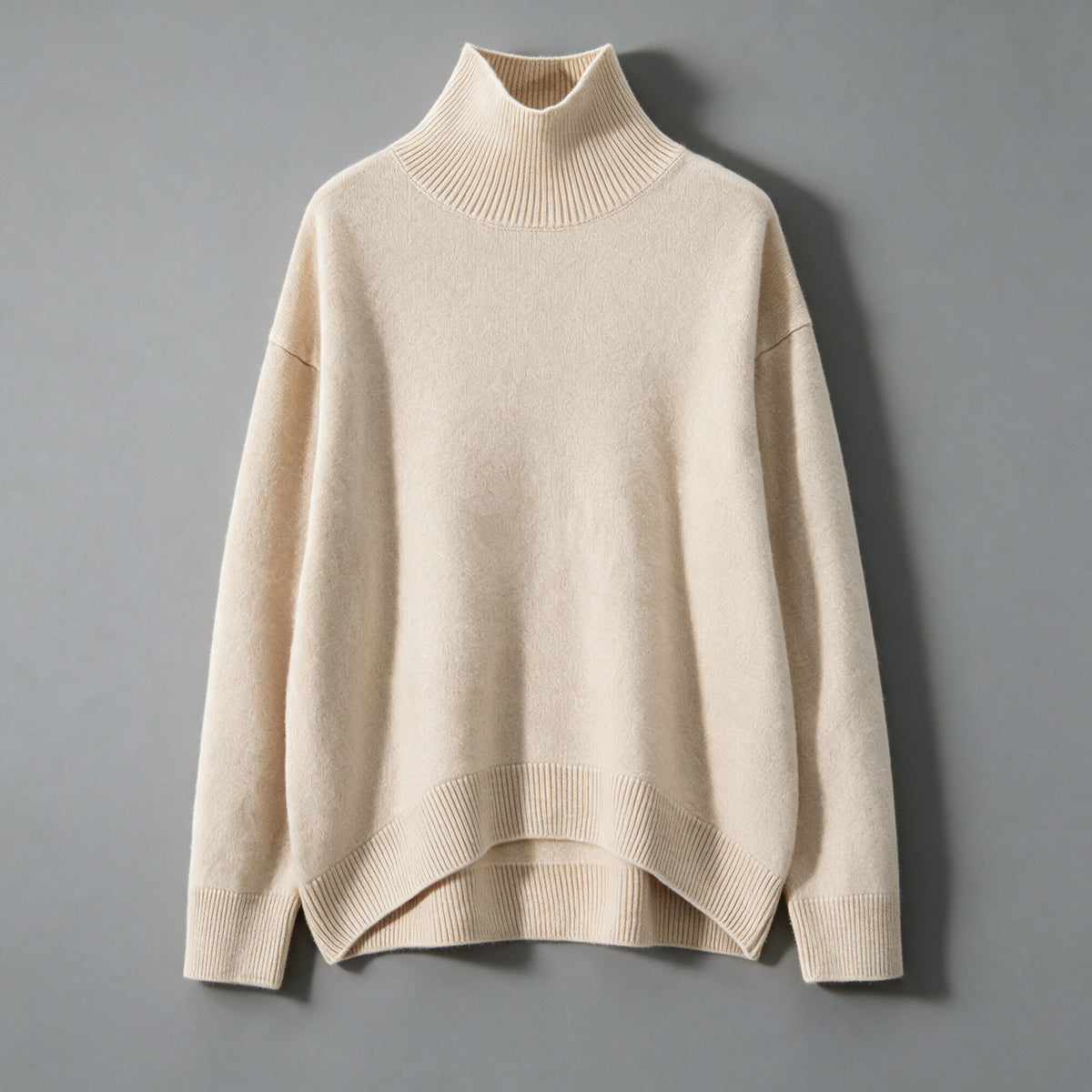 Beige cashmere turtleneck sweater, front view, ribbed collar, cuffs and hem