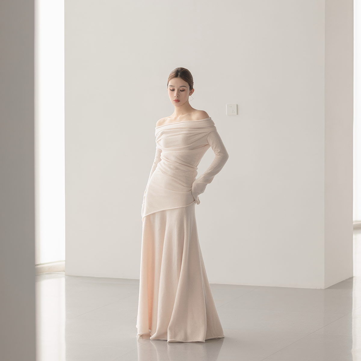 pale pink off-shoulder top and A-line skirt set, front view on model, neckline straight across both shoulders
