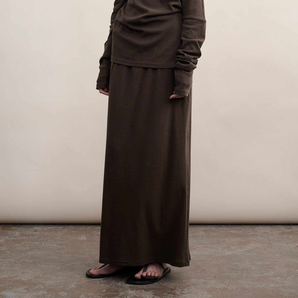 Brown cotton skirt, view from waist to floor on model