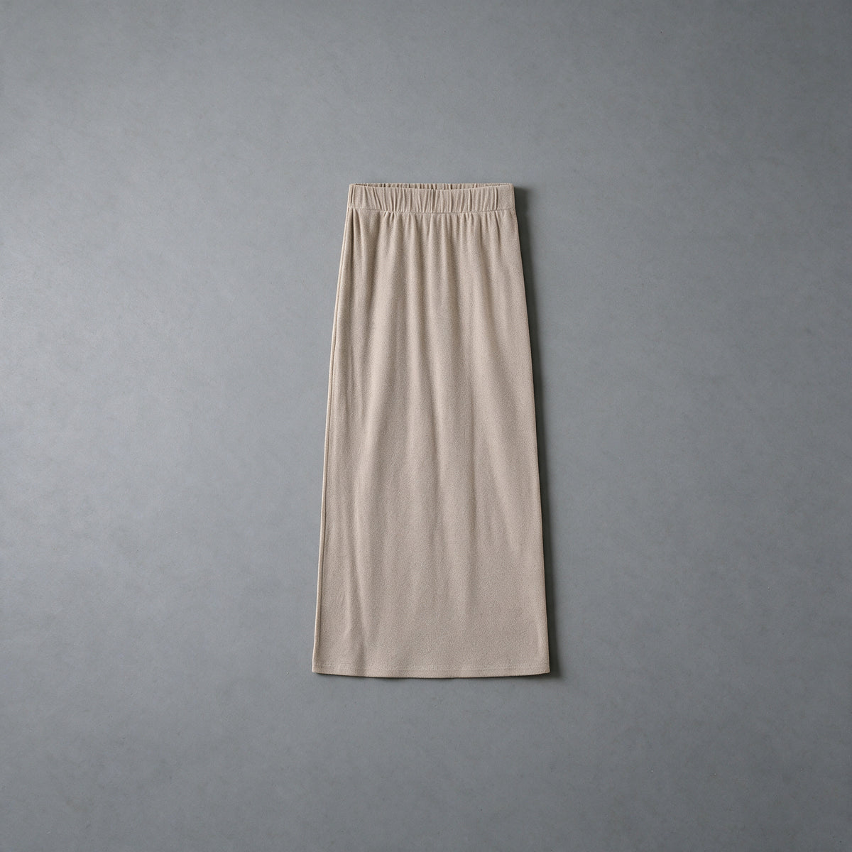 Light greige cotton skirt with an elastic waistband, flat view