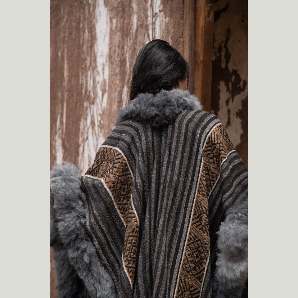 Catalina Heritage Baby Alpaca Wool Cape draped elegantly, embodying timeless quiet luxury.