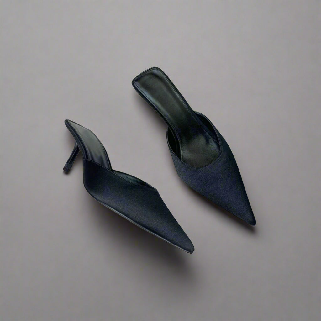 The perfect black satin pumps by Haute Globetrot. Black satin high heels for formal occasions.