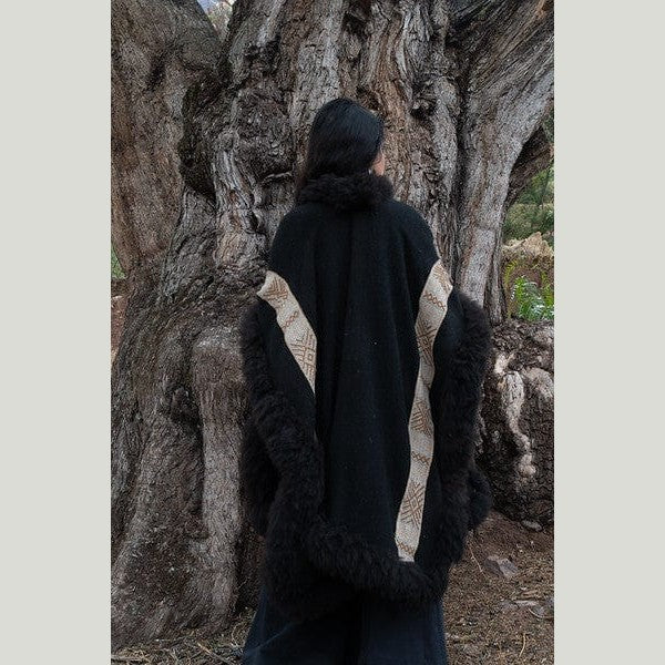 Back view of black baby alpaca wool cape
