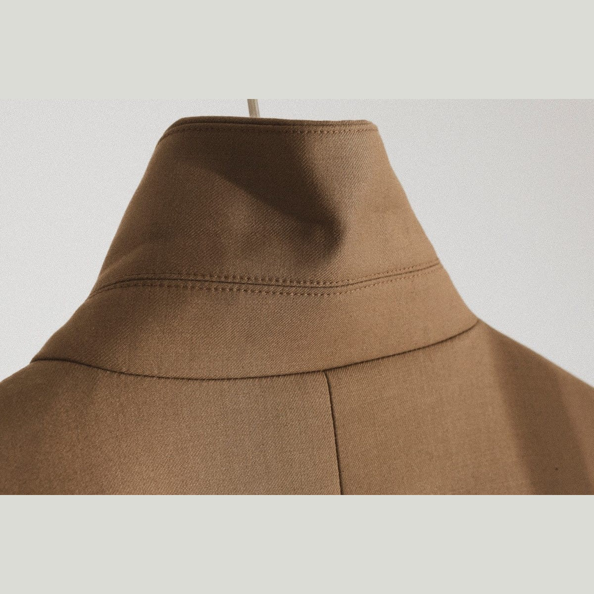 collar of brown trench coat