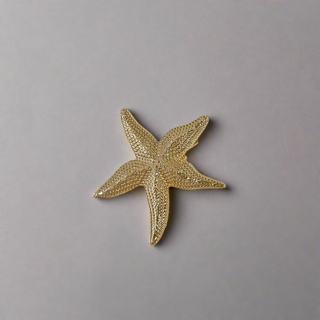 gold starfish hair clip
