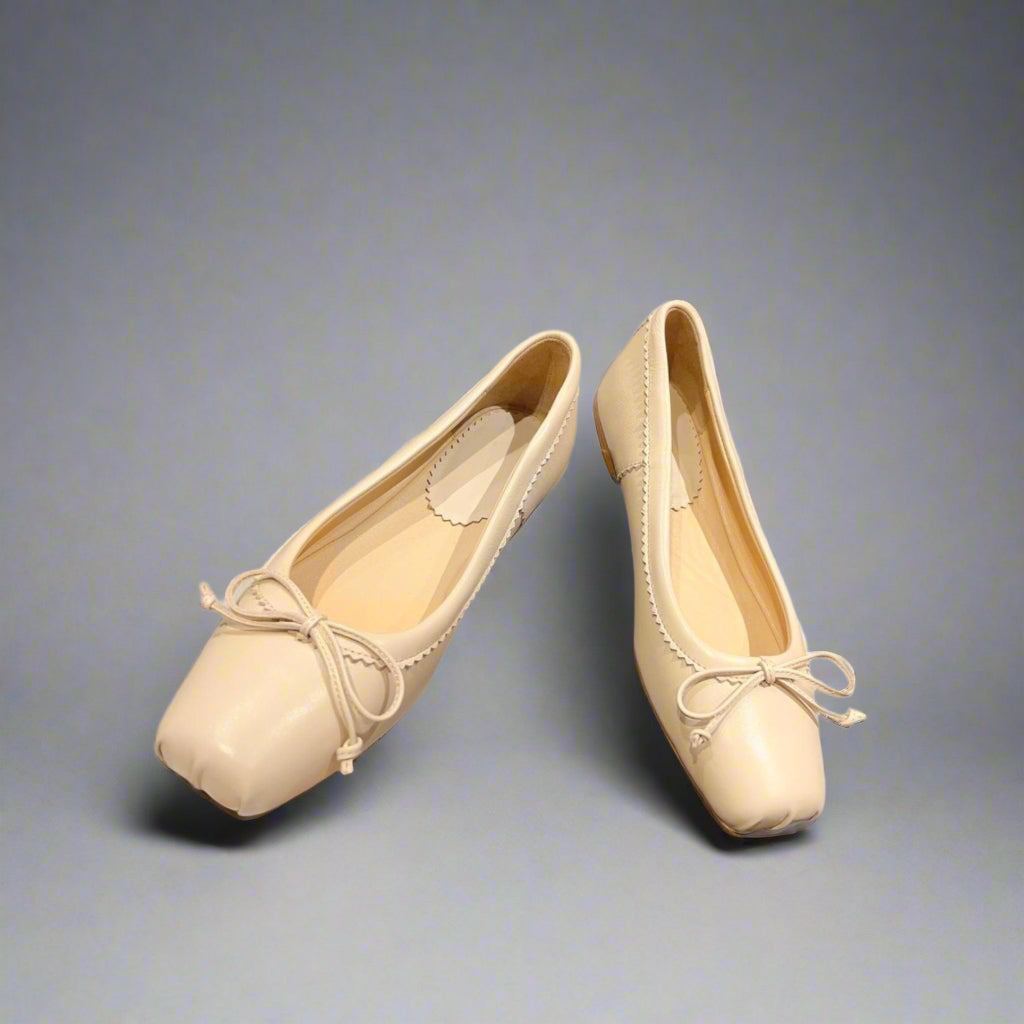 A wardrobe staple—quiet luxury ballet flats that pair with everything.
