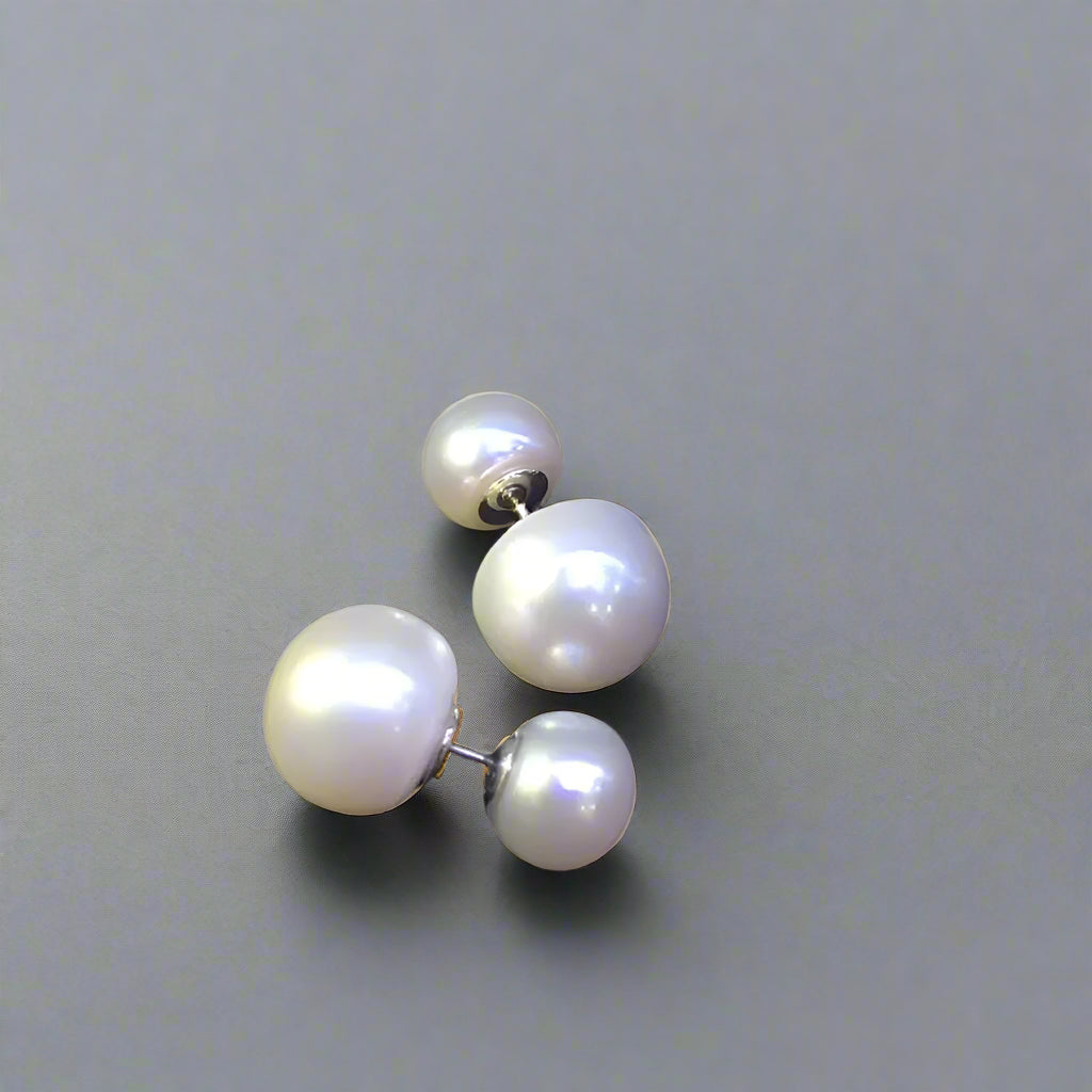 A close-up of the real pearl earrings, highlighting the natural glow of these high quality basics