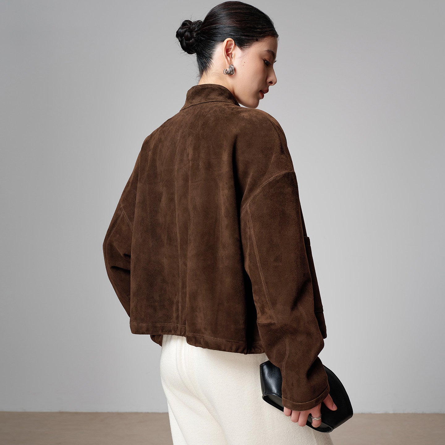 Material detail of the brown sheepskin suede jacket