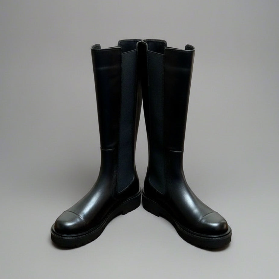 Tall black leather riding boots — detail