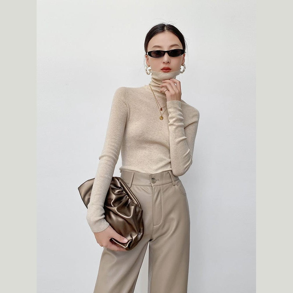 No seams, no stress—3D seamless knit cashmere turtleneck for total sensory comfort.