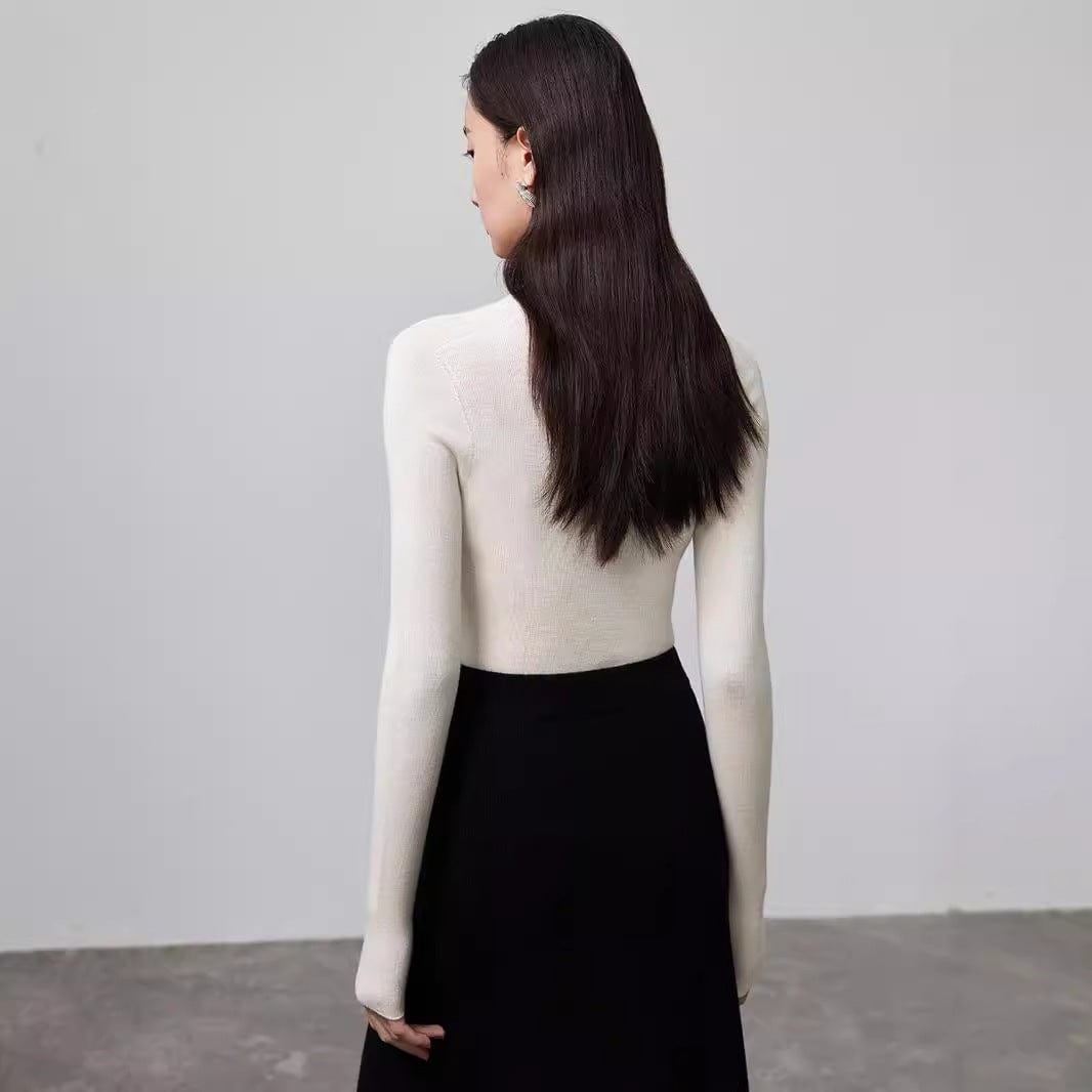 Second-skin comfort—this white seamless knit base layer moves with you all day.